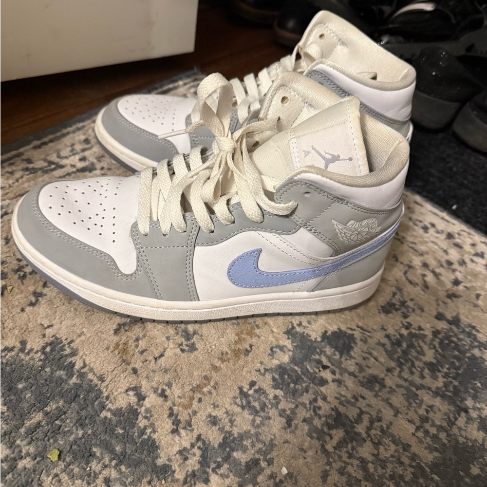 gray Nike Air Jordan Sneakers with Light Blue swoosh